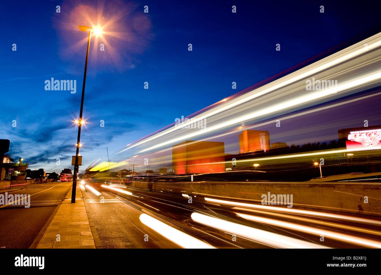 Blurred Traffic at Dusk On Waterloo Bridge  London UK Europe Stock Photo