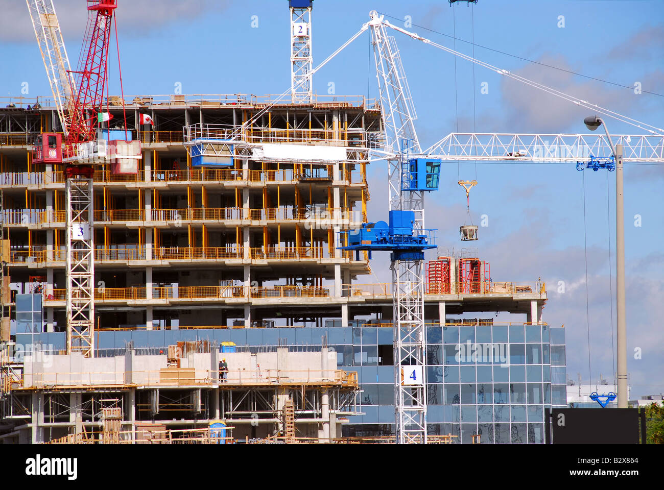 Construction of a tall modern building Stock Photo