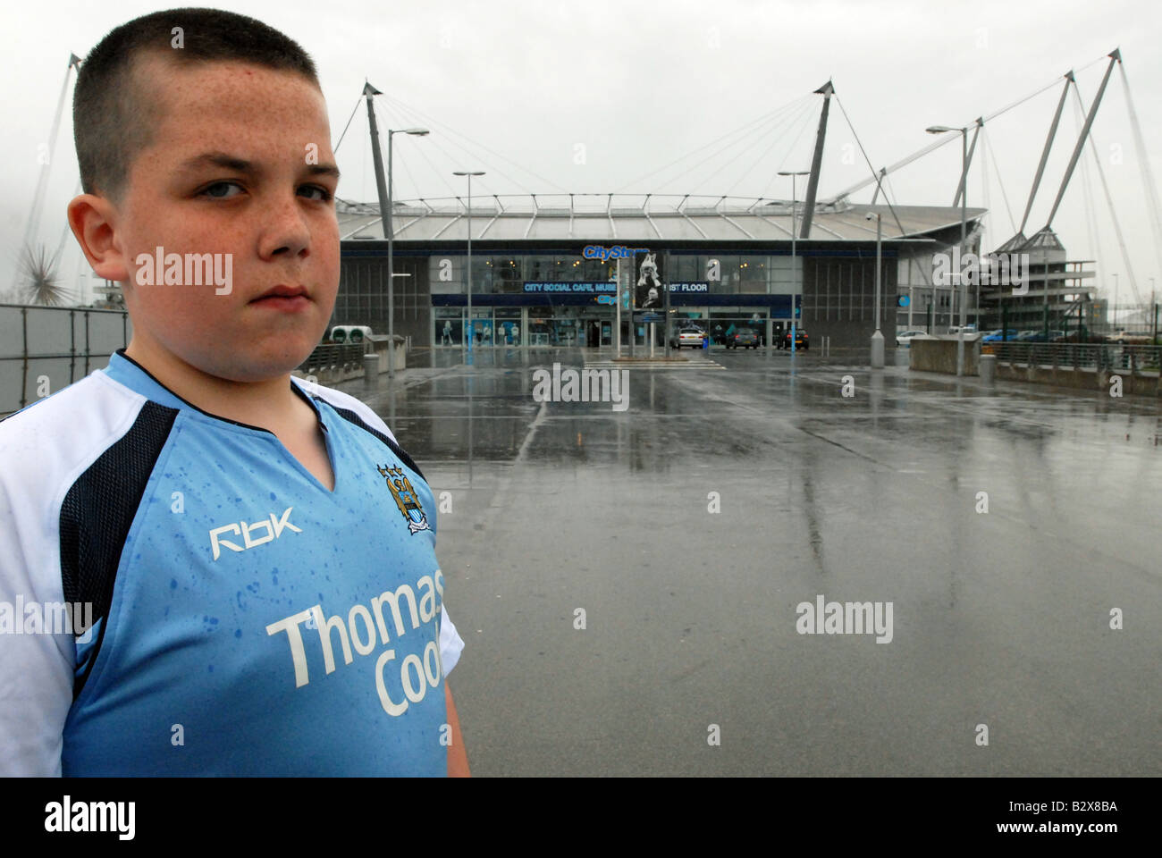 Fan outside City of Manchester Stadium Manchester City F.C Stock Photo