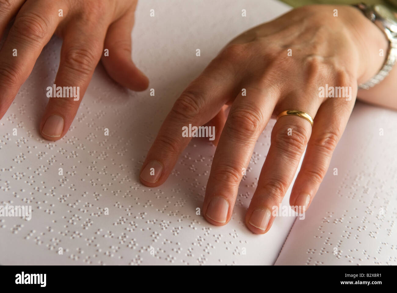 Blind woman reading Braille, East Kilbride, Scotland Stock Photo Alamy