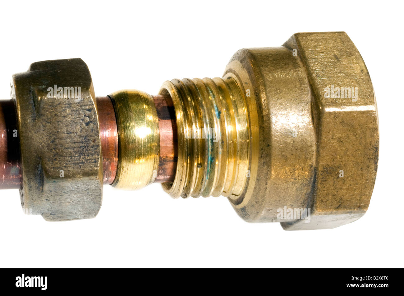1 inch to 15mm brass compression fitting Stock Photo