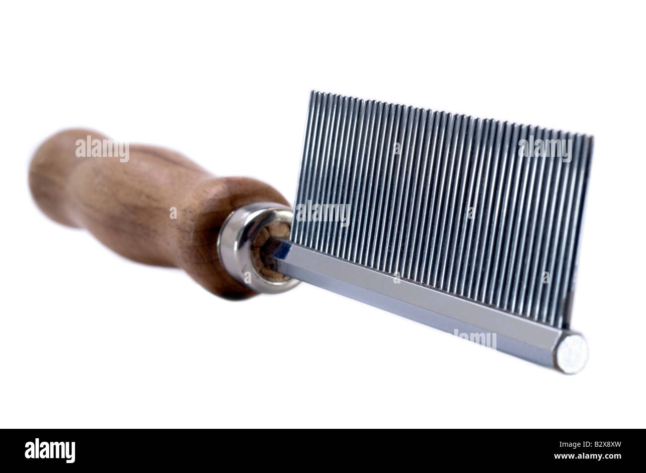 Wooden handled dog flea comb Stock Photo Alamy