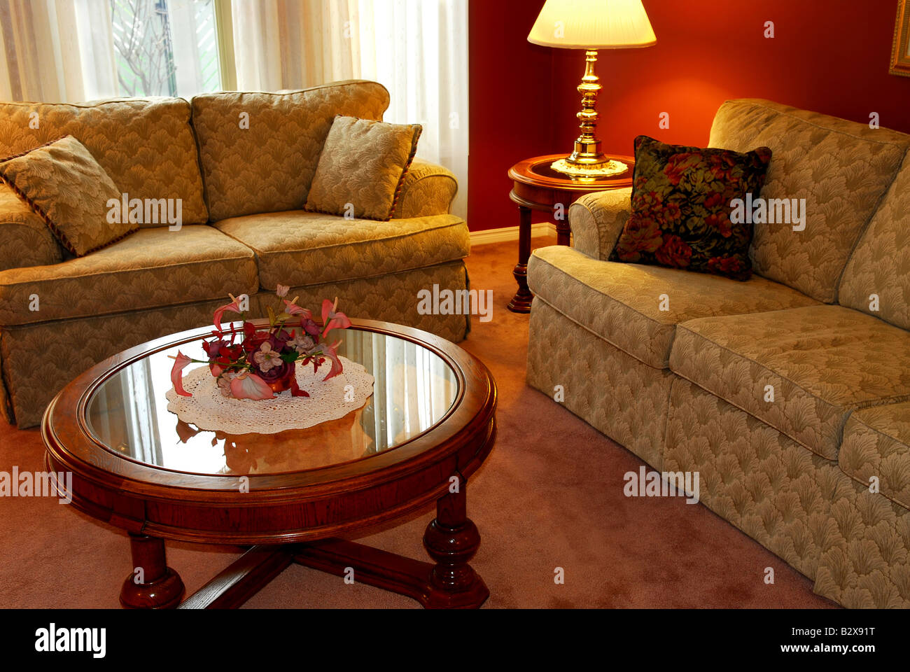 Interior of a cozy living room with sofas and coffee table Stock Photo ...