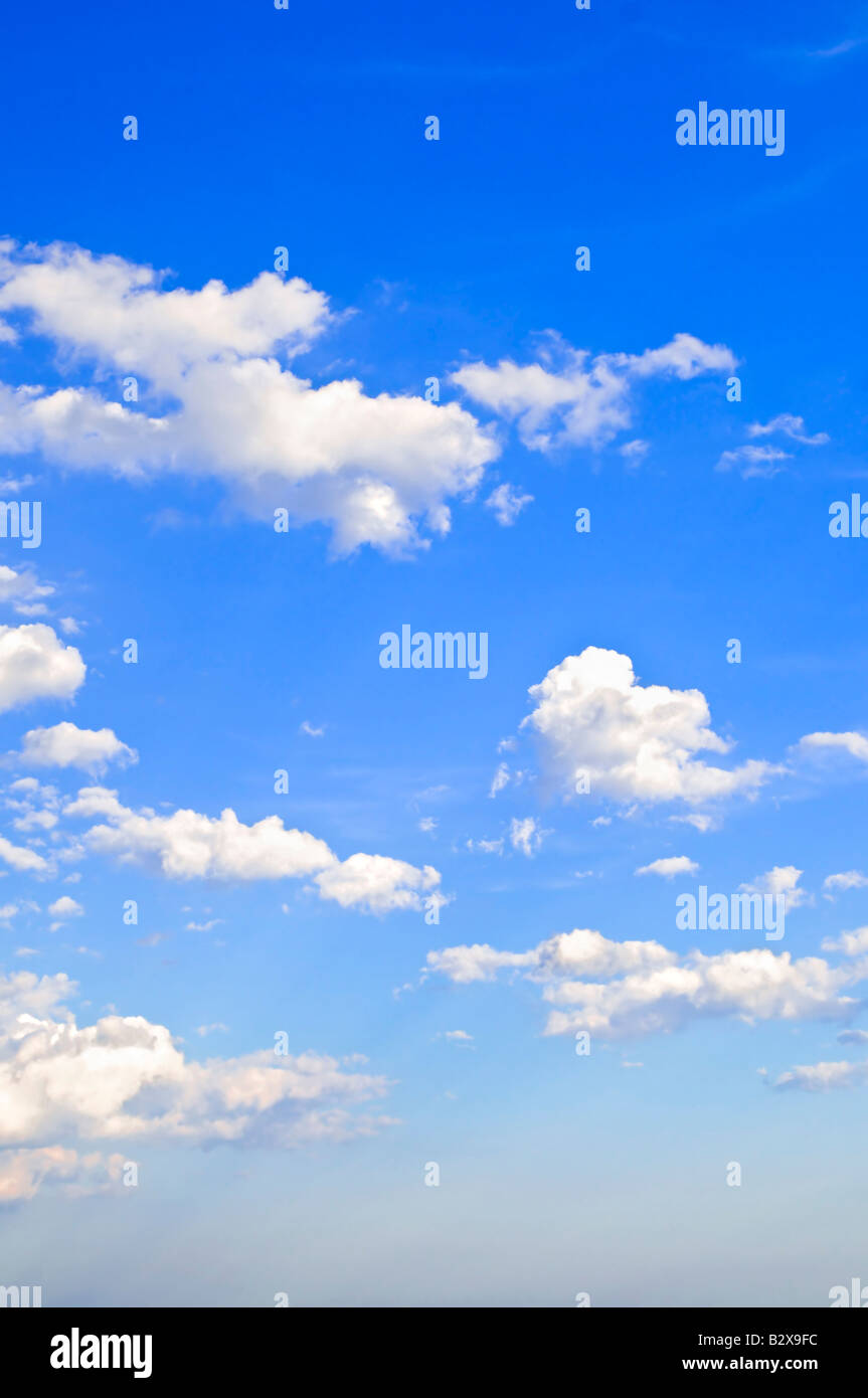 Background of blue sky with white cumulus clouds Stock Photo - Alamy