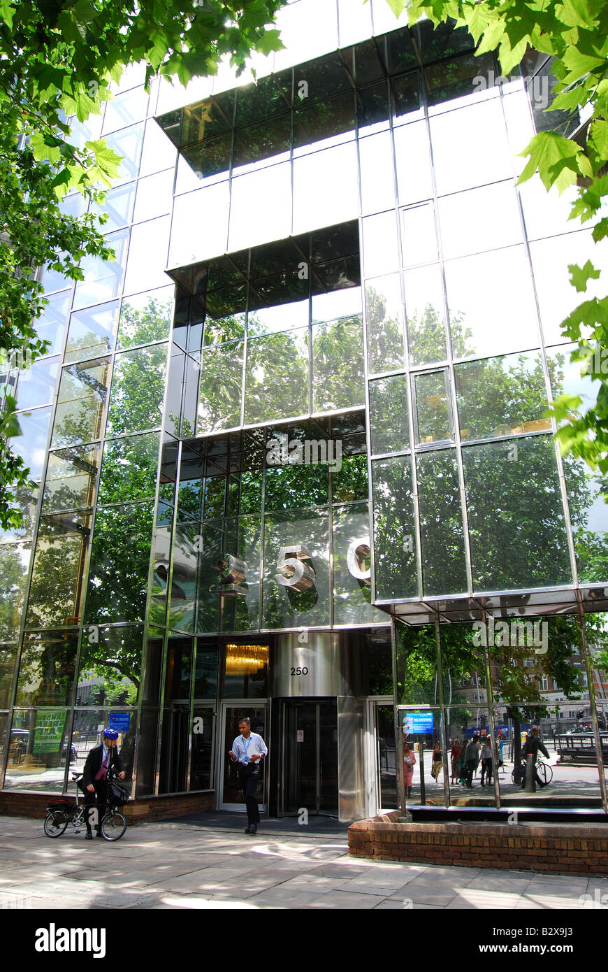 Glass-fronted office building entrance, 50 Euston Road, Camden Borough, London, England, United Kingdom Stock Photo