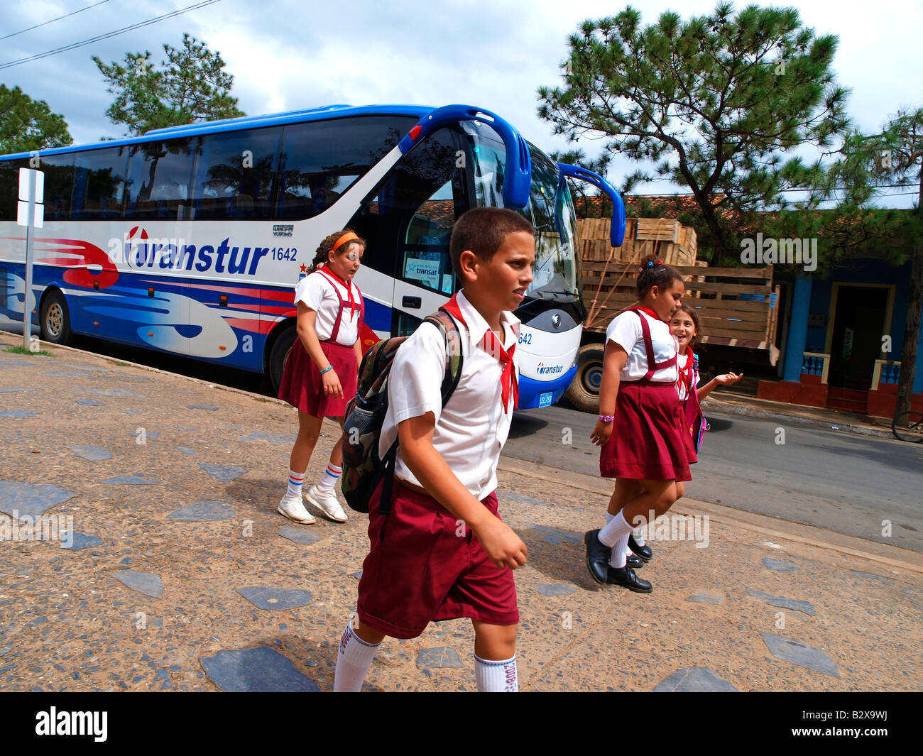 Cuba, tourist bus, pupils Stock Photo