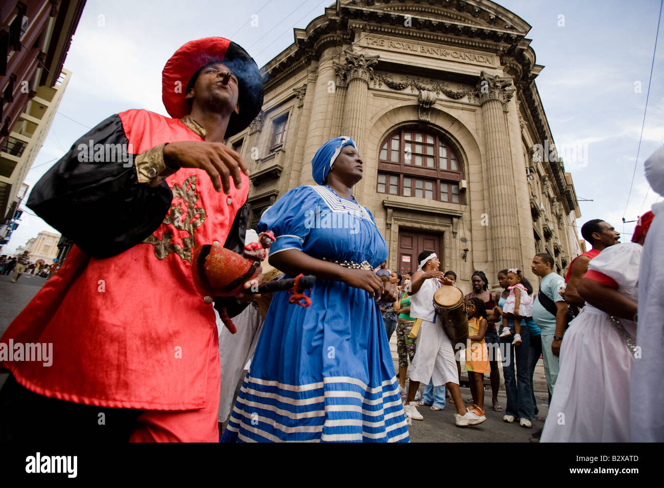 Dancers perform on the streets during the Fire festival in Santiago, Cuba Stock Photo