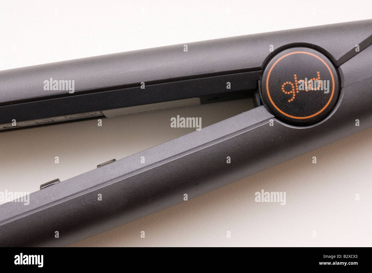 A pair of Ghd professional hair straightening irons for straightening hair Stock Photo
