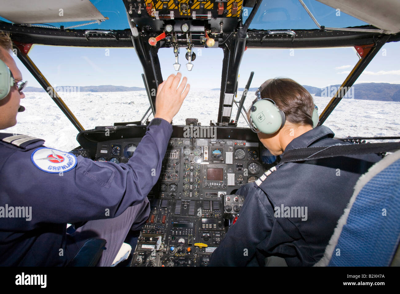 An Air Greenland Sikorsky helicopter flying over the Jacobshavn