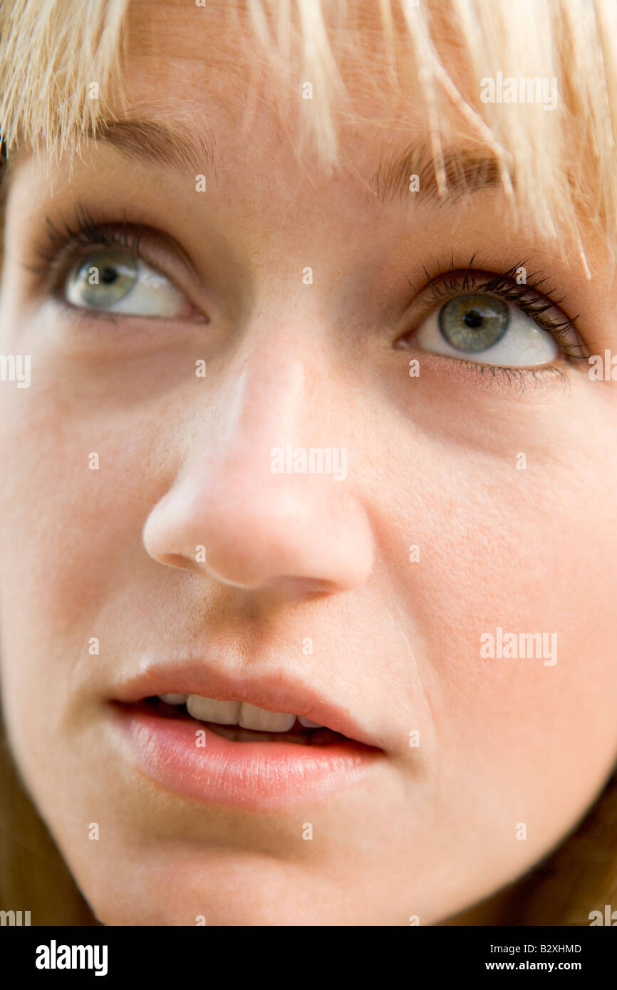 Head shot of woman thinking Stock Photo
