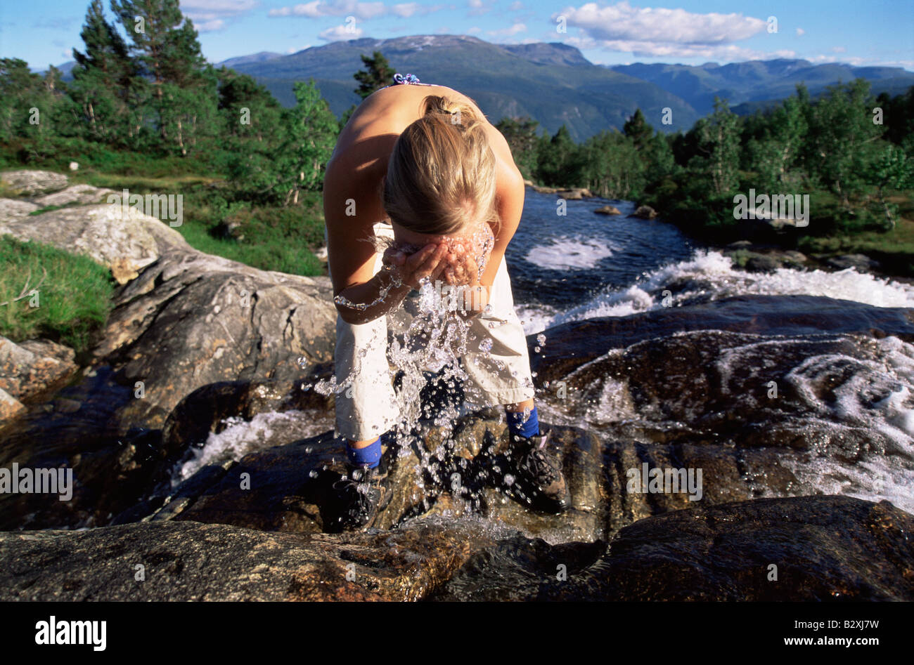 Water splashing face woman hi-res stock photography and images - Alamy