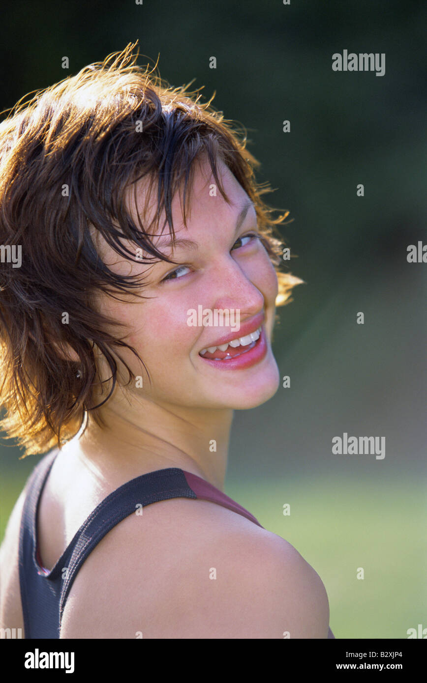 Woman exercising in park Stock Photo