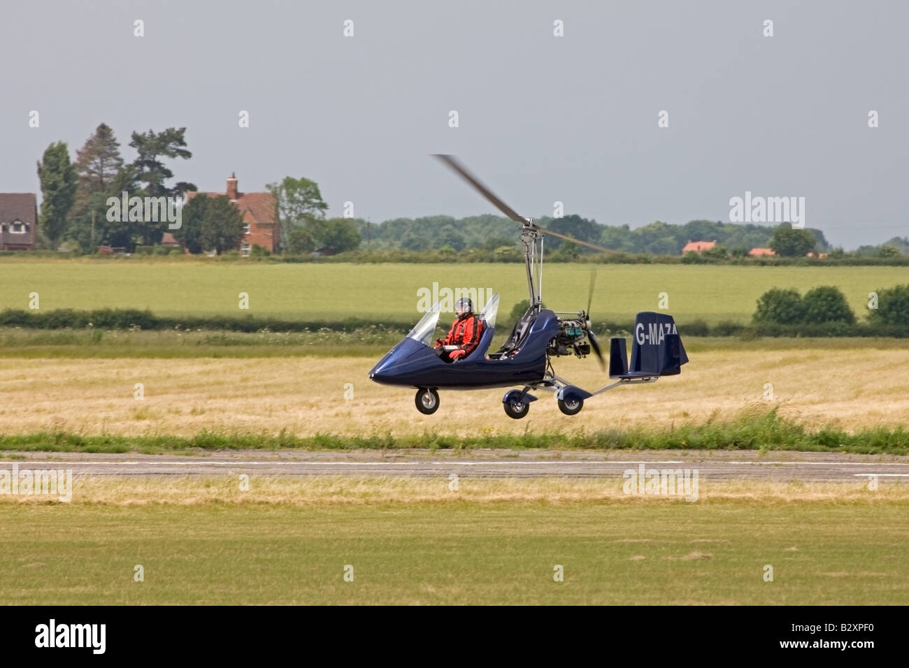 Rotorsport UK MT03 Gyroplane GMAZA landing at Wickenby Airfield Stock