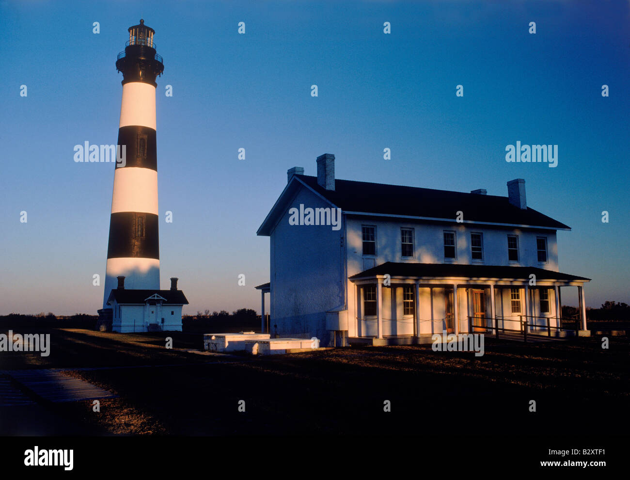 Bodie Island Lighthouse at Cape Hatteras National Seashore in North Carolina at sunset Stock Photo