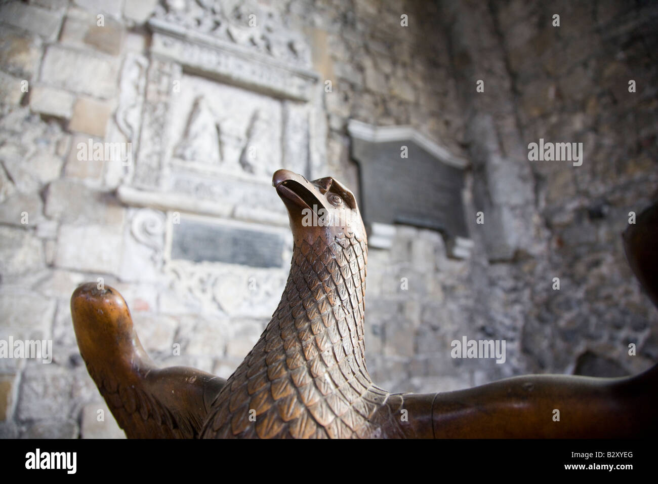 Carved wooden eagle lectern in a church Stock Photo