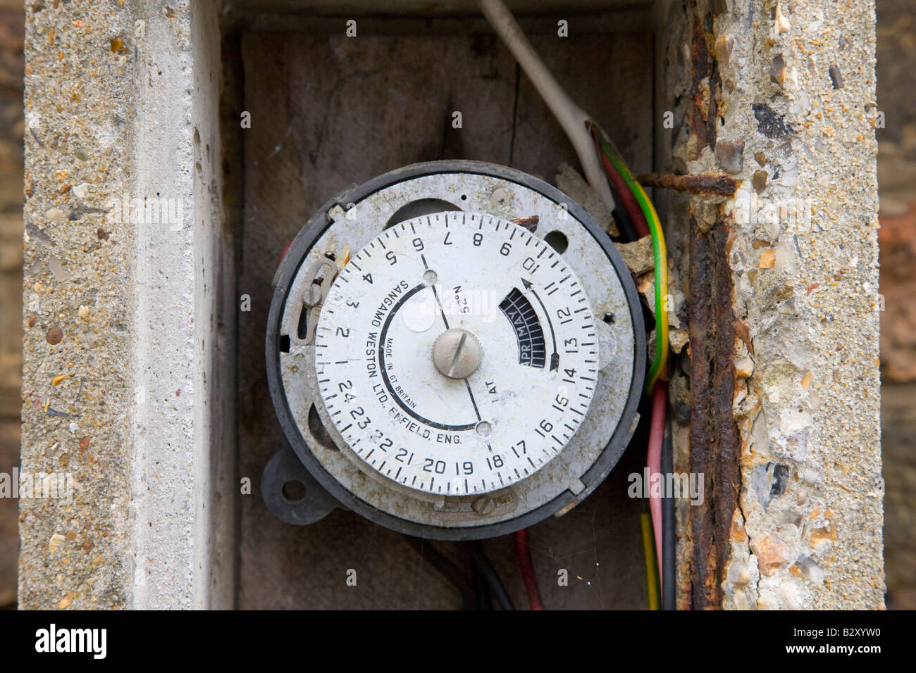 Timer inside concrete lamp post Stock Photo Alamy