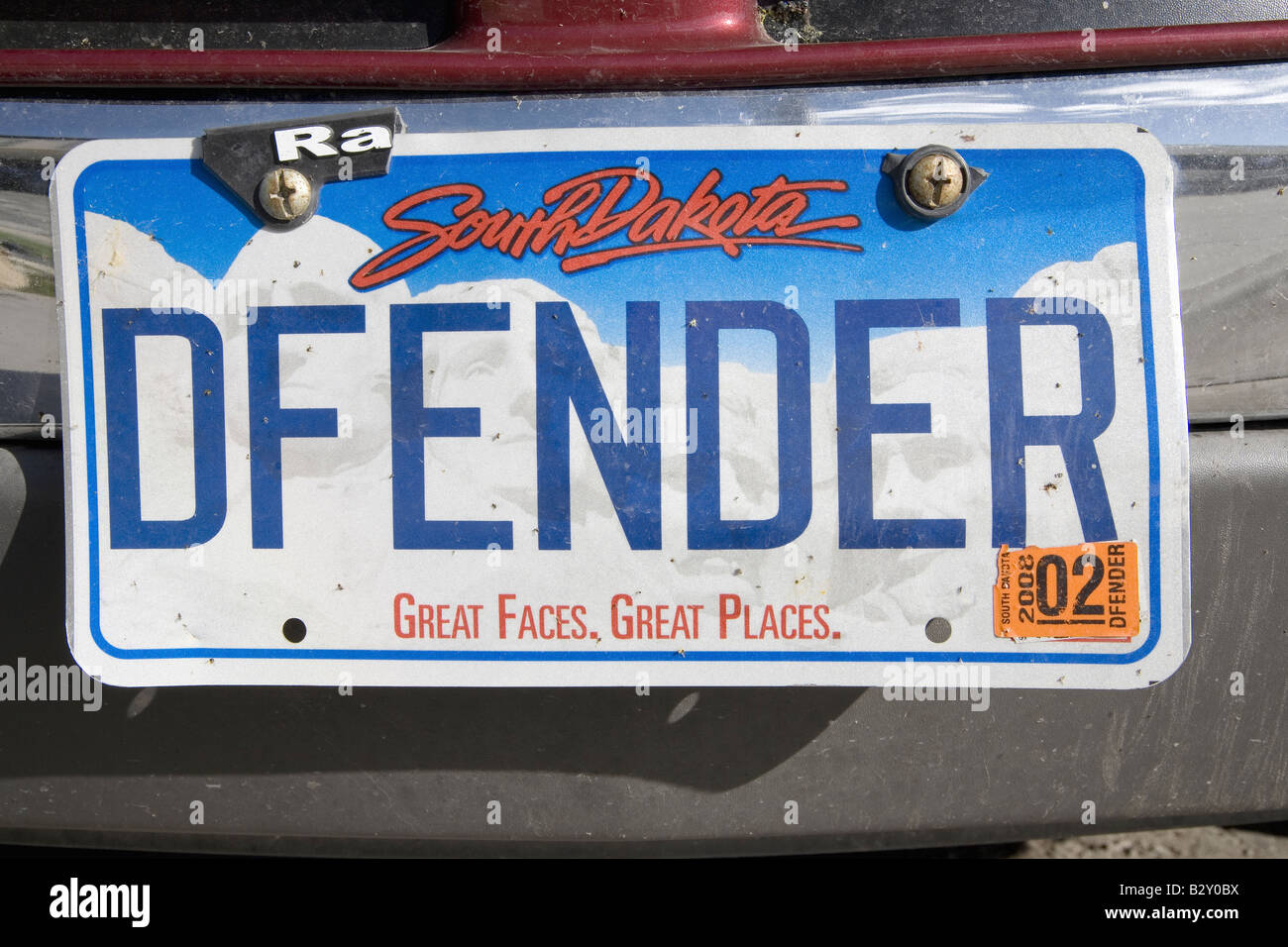 South Dakota custom license plate reading "Defender" in South Dakota Stock Photo Alamy