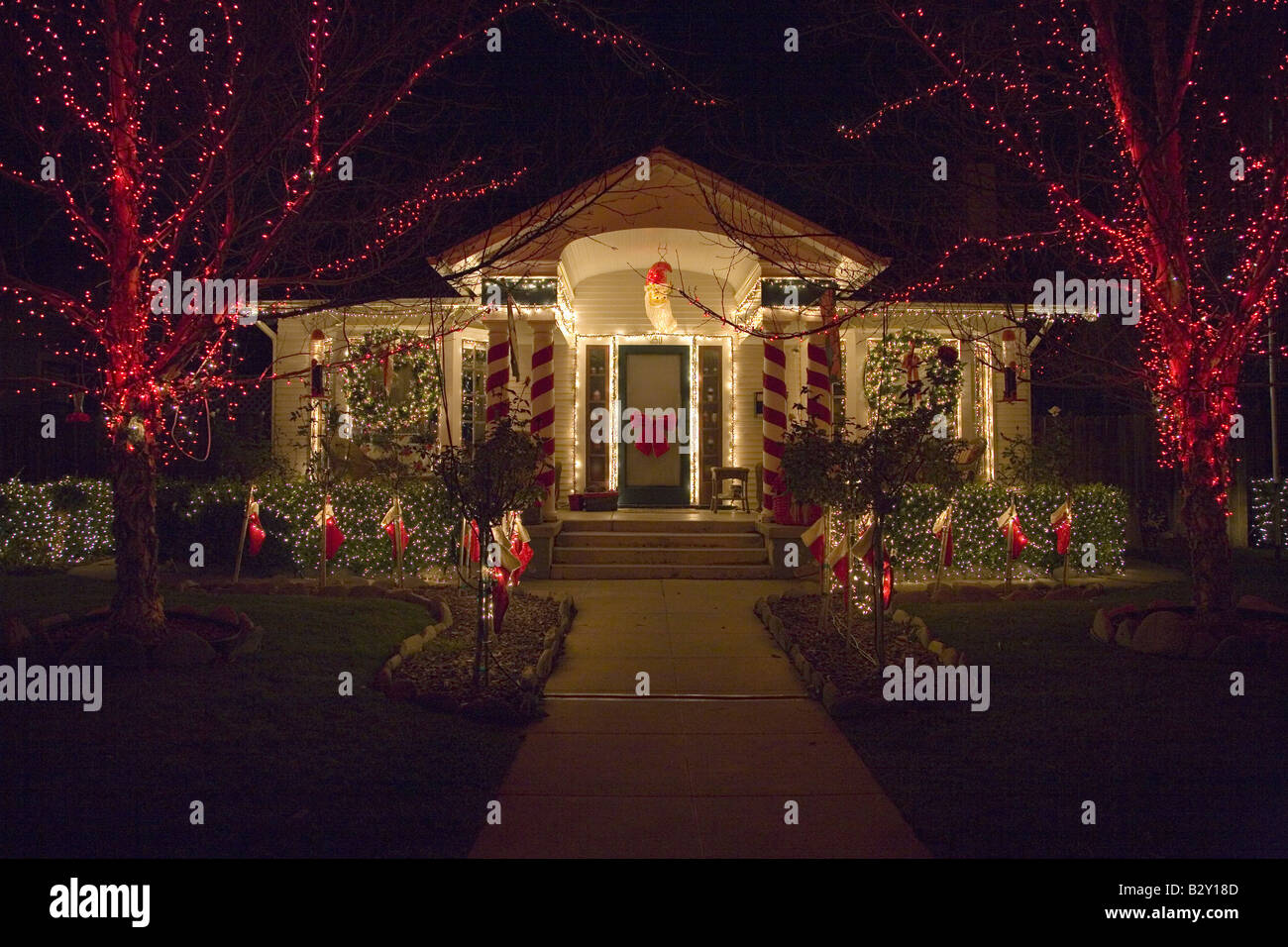 Christmas lights and deer in front of house in Oxnard, California Stock