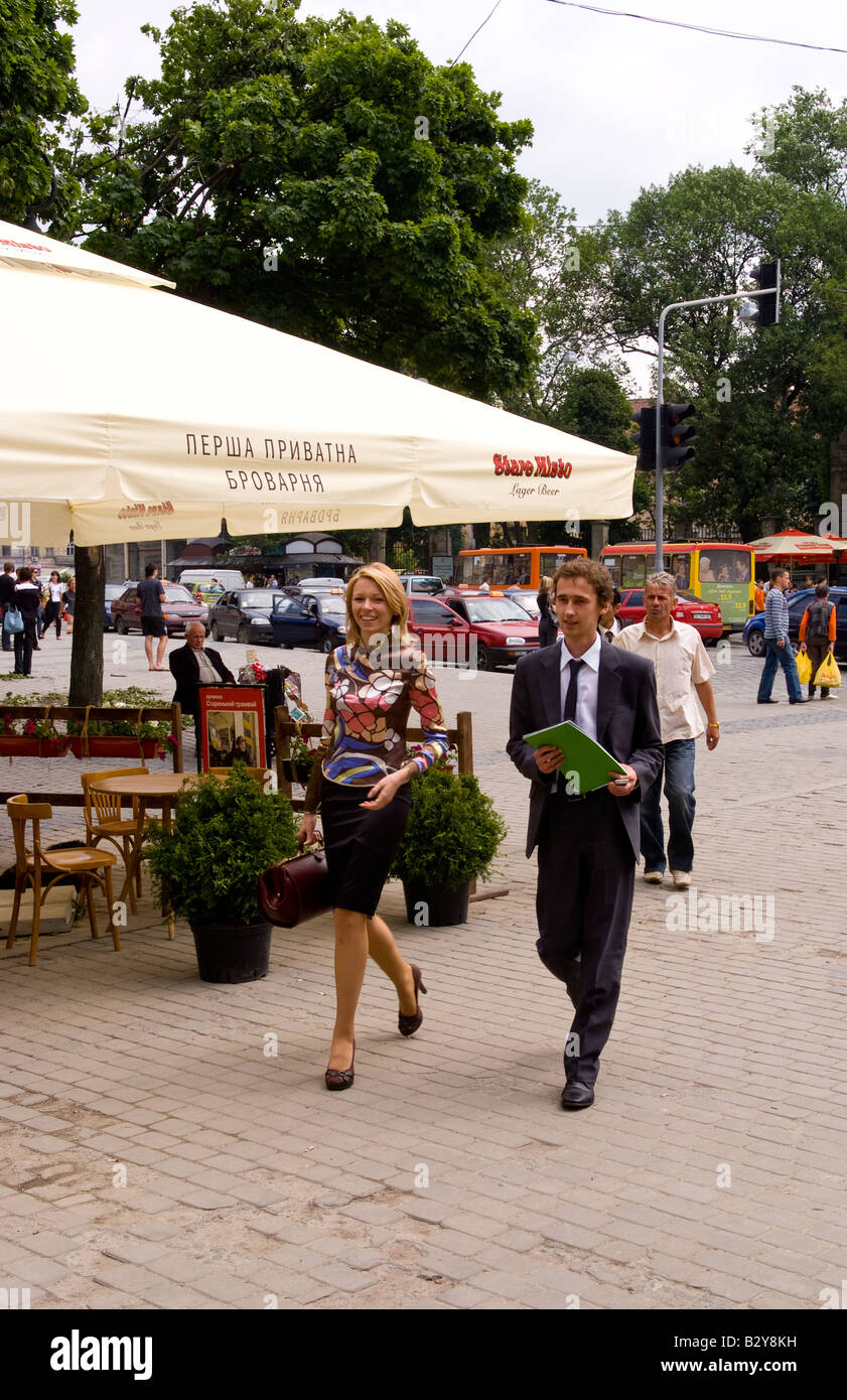 Modern couple in modern dress in downtown city center of Lviv Ukraine Stock Photo