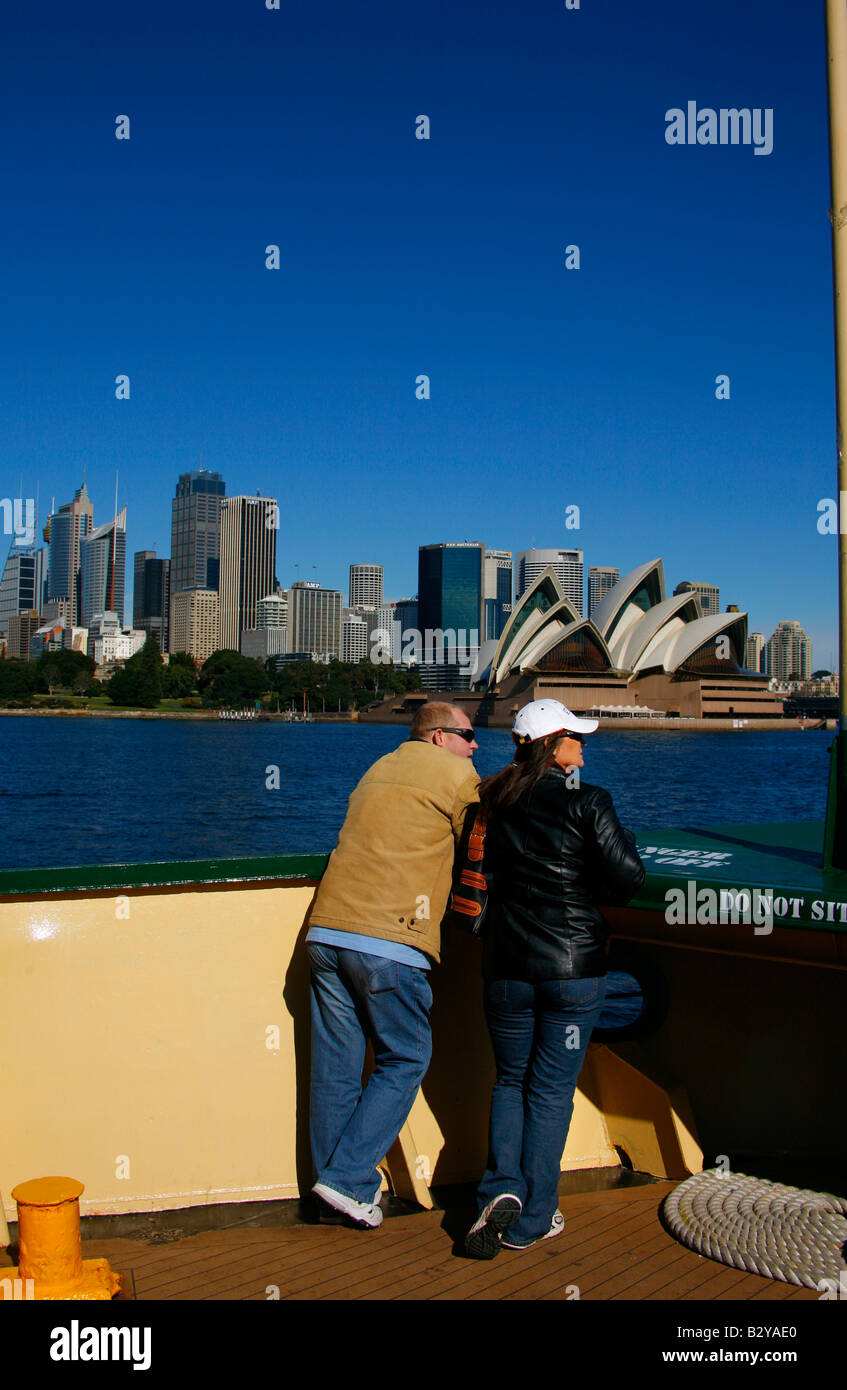 Sydney Opera house from Manly ferry with people Stock Photo