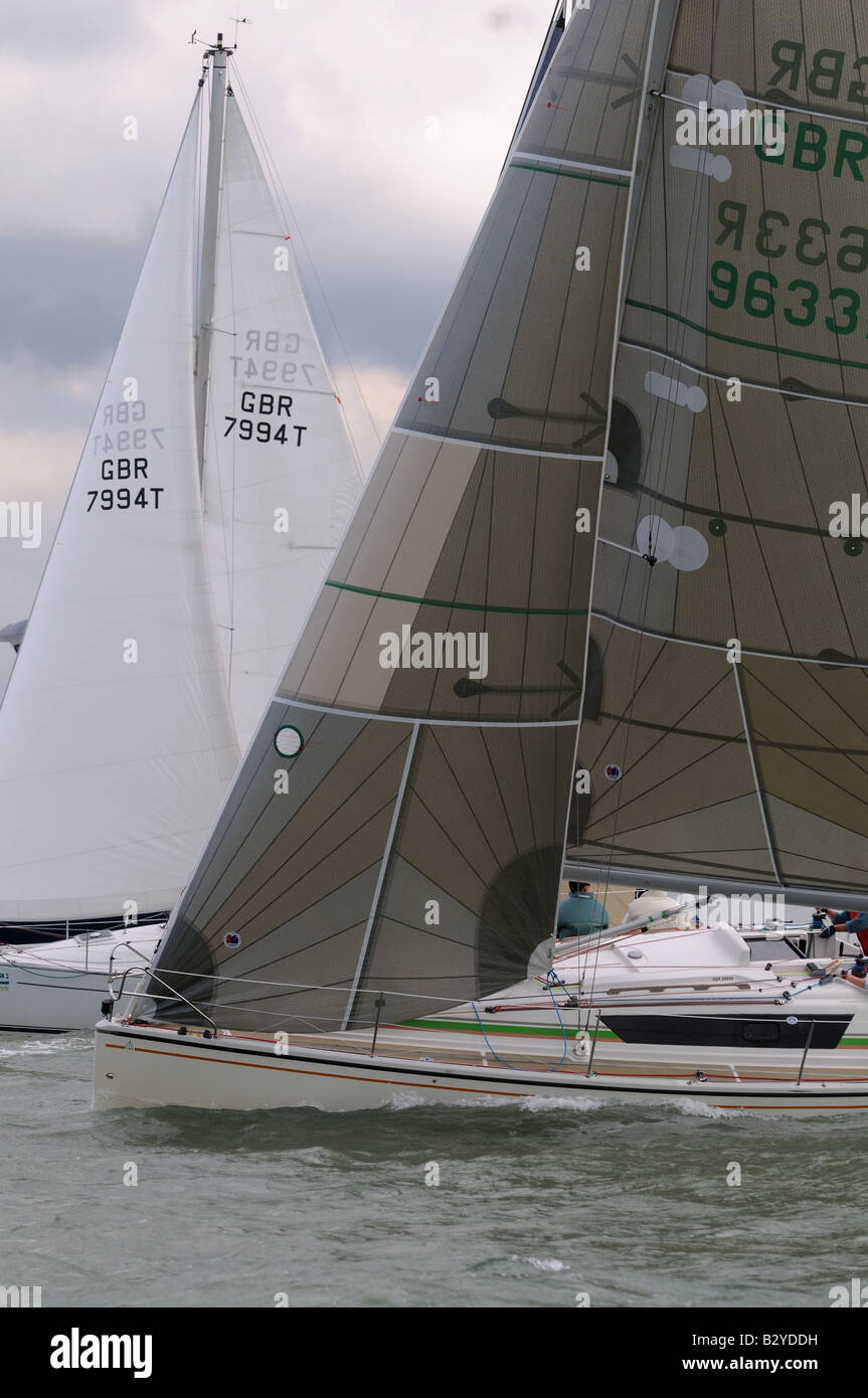 race start upwind bow of boats sailing Cowes Week Isle of Wight Stock Photo