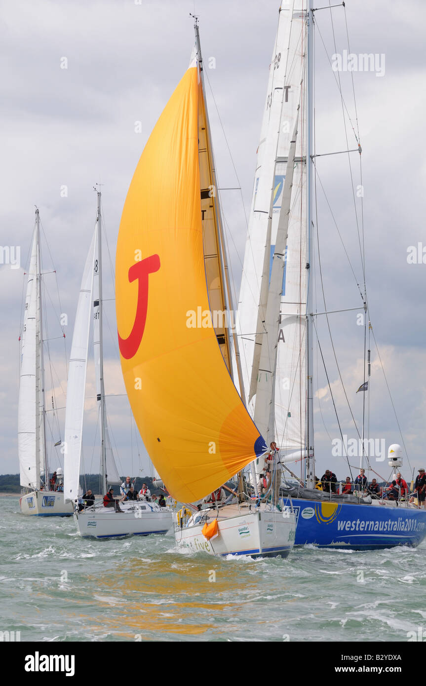 downwind sailing with asymmetric sail Cowes Week Isle of Wight Stock