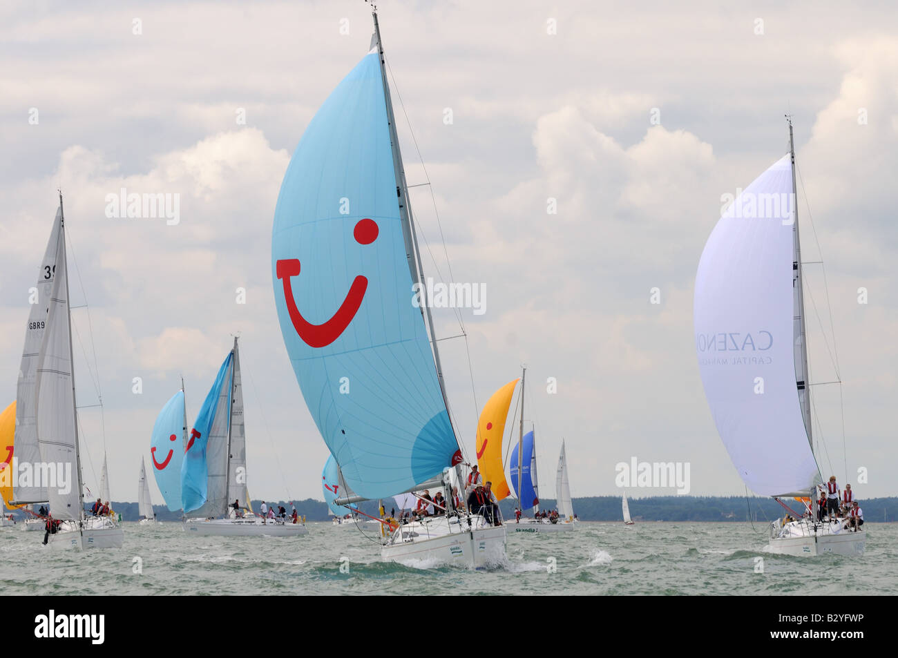 downwind sailing with asymmetric sail Cowes Week Isle of Wight Stock