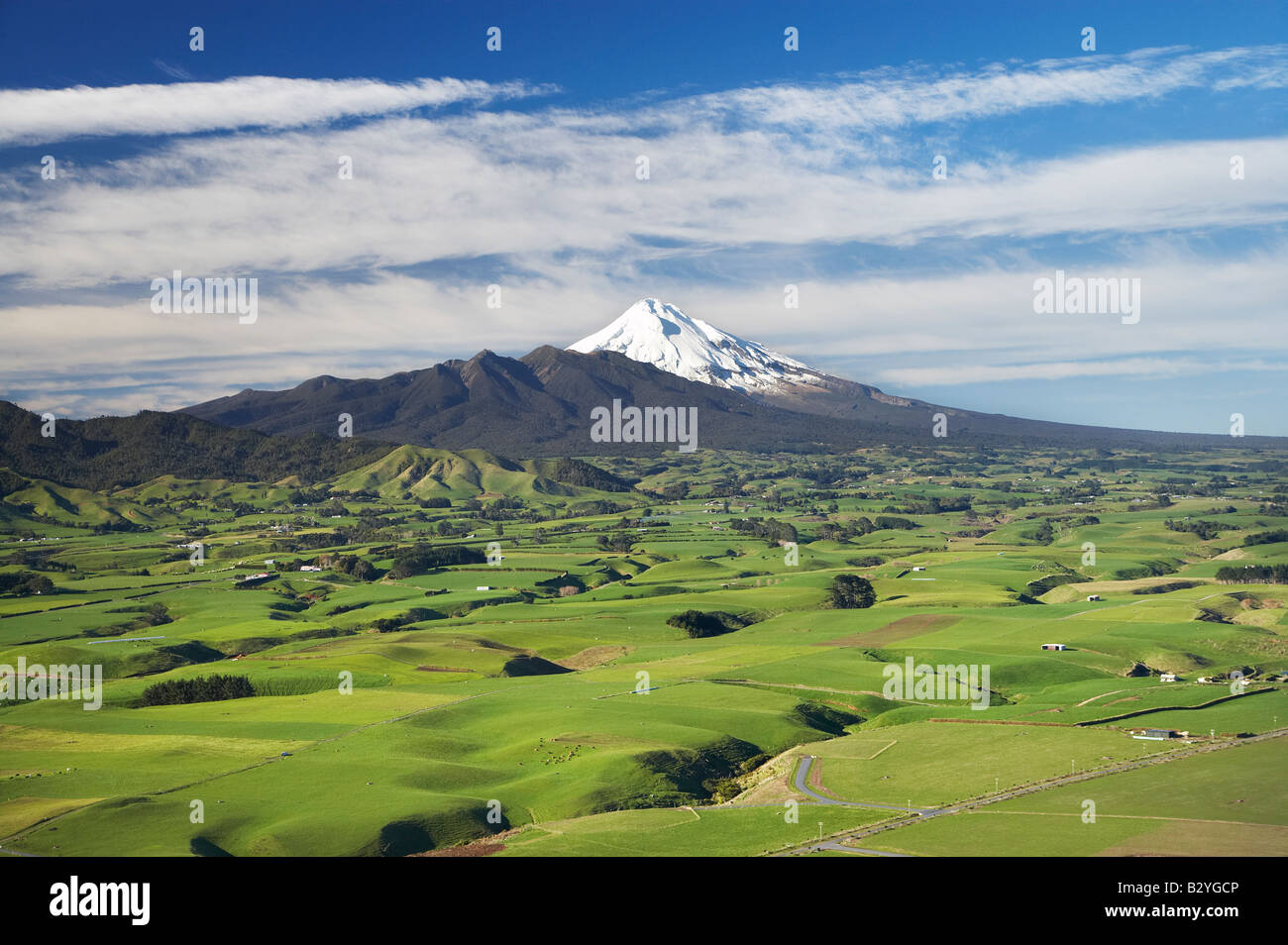Farmland near Okato and Mt Taranaki Mt Egmont Taranaki North Island New Zealand aerial Stock
