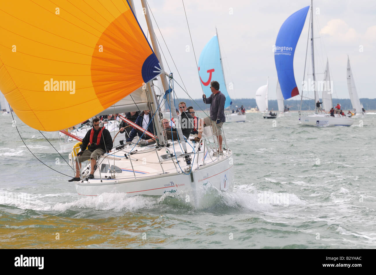 downwind sailing with asymmetric sail Cowes Week Isle of Wight Stock