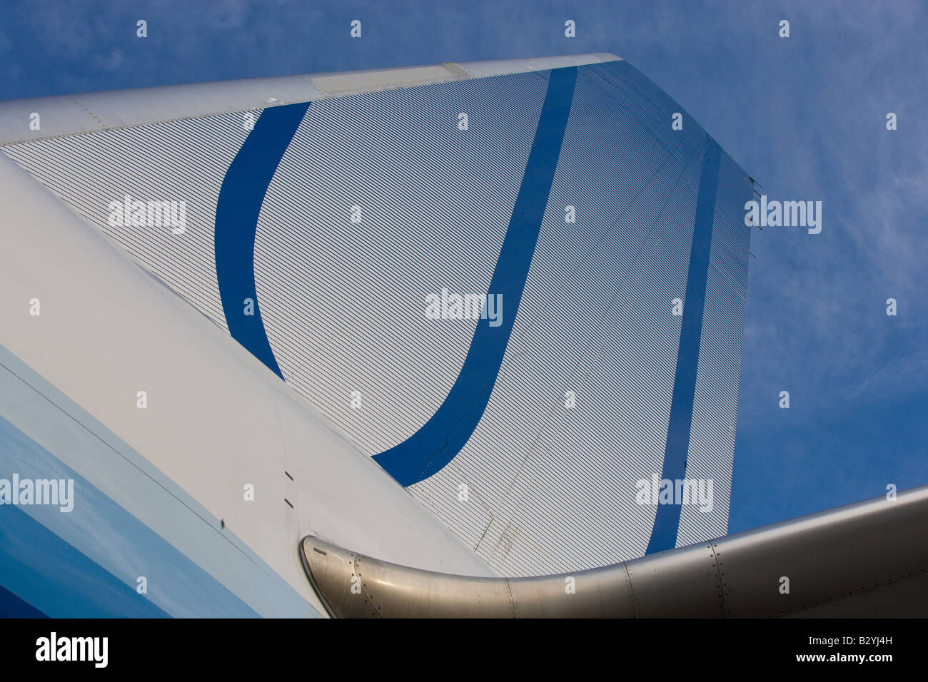 United Airlines airplane wing and sky with clouds Stock Photo