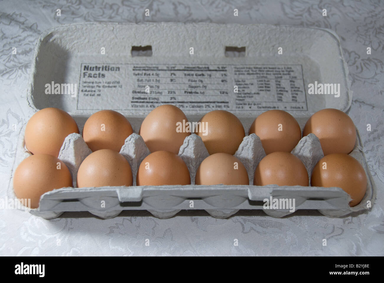Dozen organic brown eggs Stock Photo Alamy