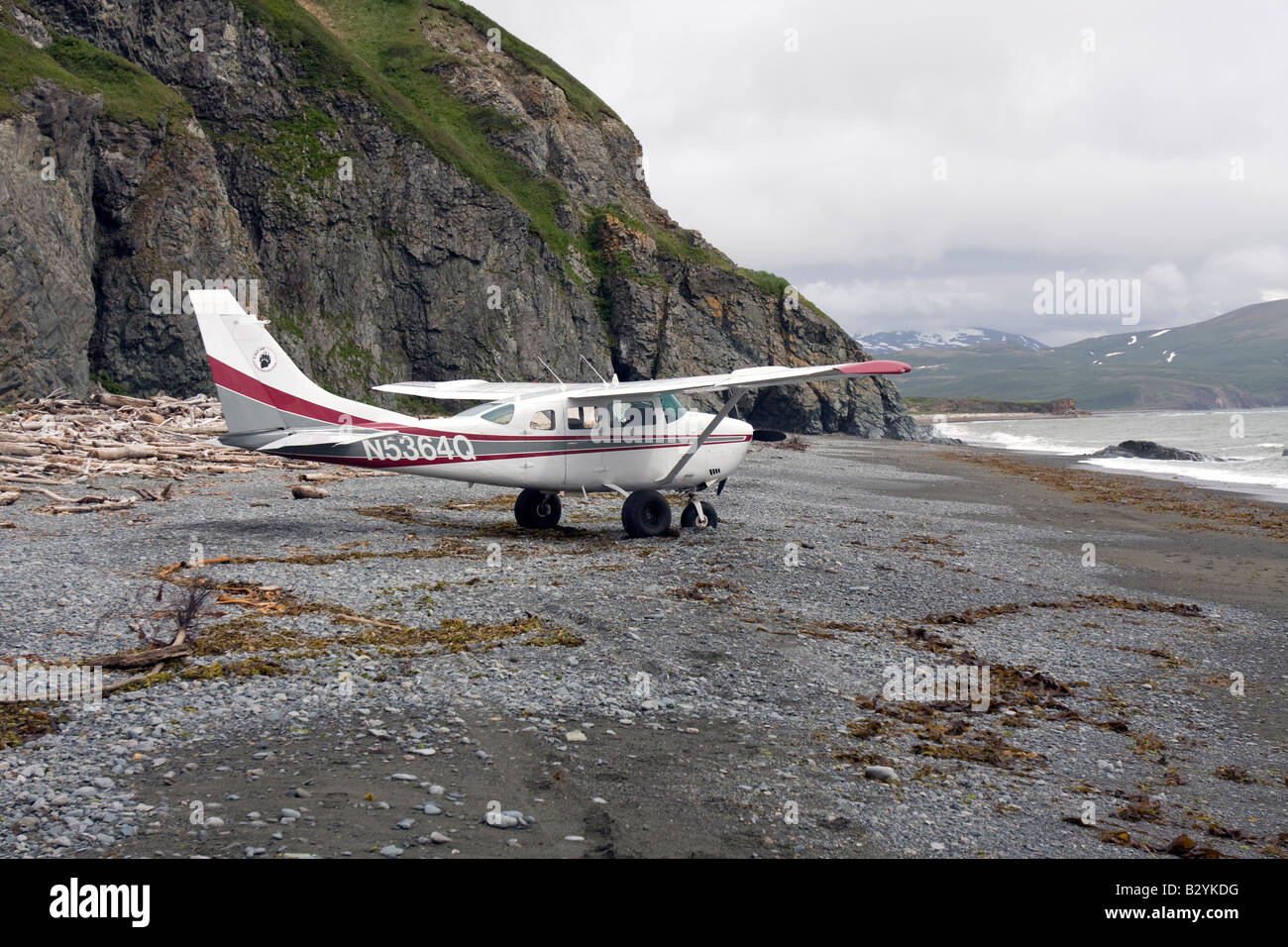 Small Cessna airplane on a beach in Katmai National Park & Preserve, Alaska. Stock Photo