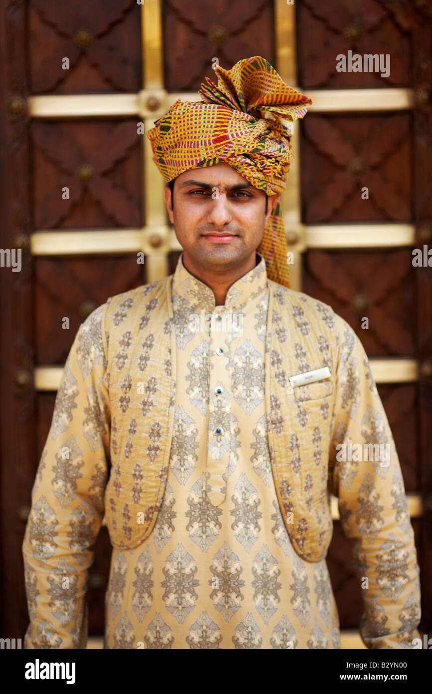 An Indian Host At The Service Of Arriving Guests At A Luxury - 