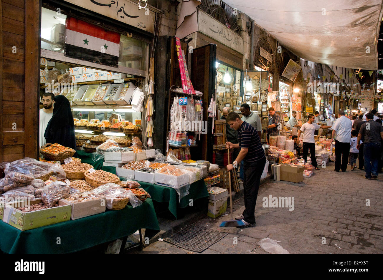 Syria. Souk in downtown Damascus early evening Due to summer heat most people come out late to shop in Souk Al Bzouriyeh Stock Photo