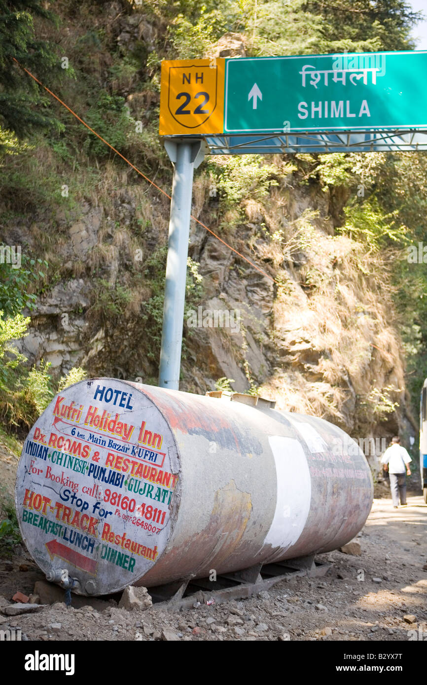 Makeshift roadsign in the mountains of Shimla, foothills of the Himalayas, India. Stock Photo