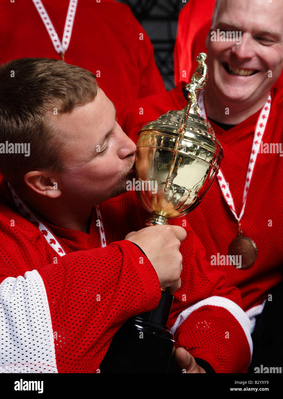 Hockey Player Kissing Trophy Stock Photo Alamy