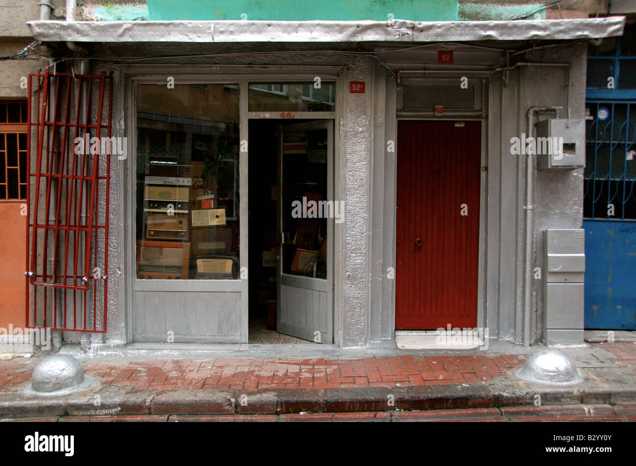 A small electronics store in the dated and atmospheric neighborhood of Balat in Istanbul, Turkey. Stock Photo