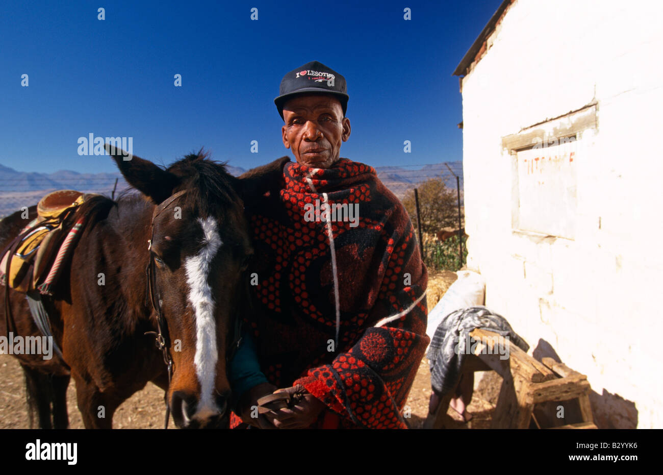 Farmer and horse in farm, Lesotho, Africa Stock Photo