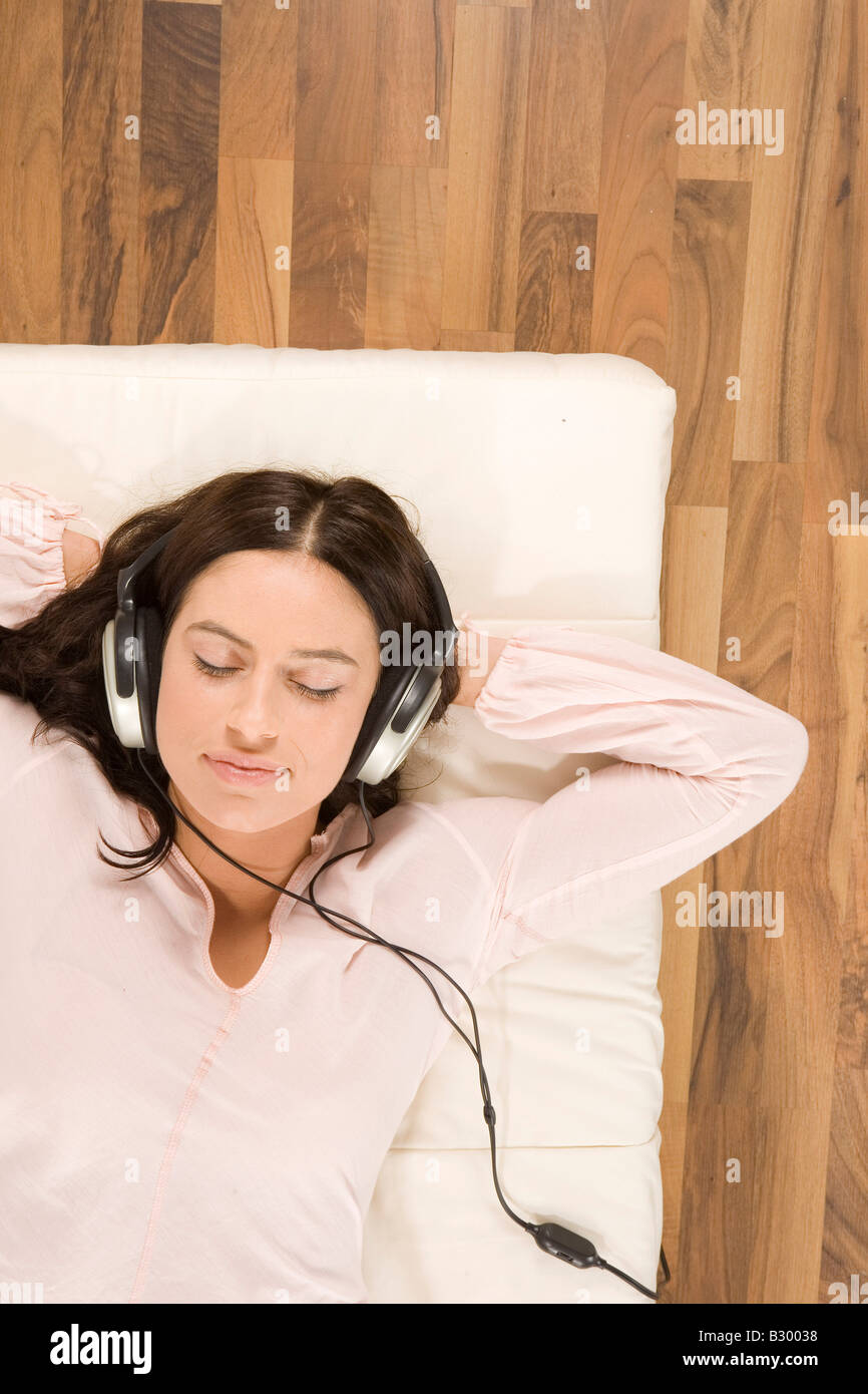 Woman Listening to Music with Headphones Stock Photo Alamy