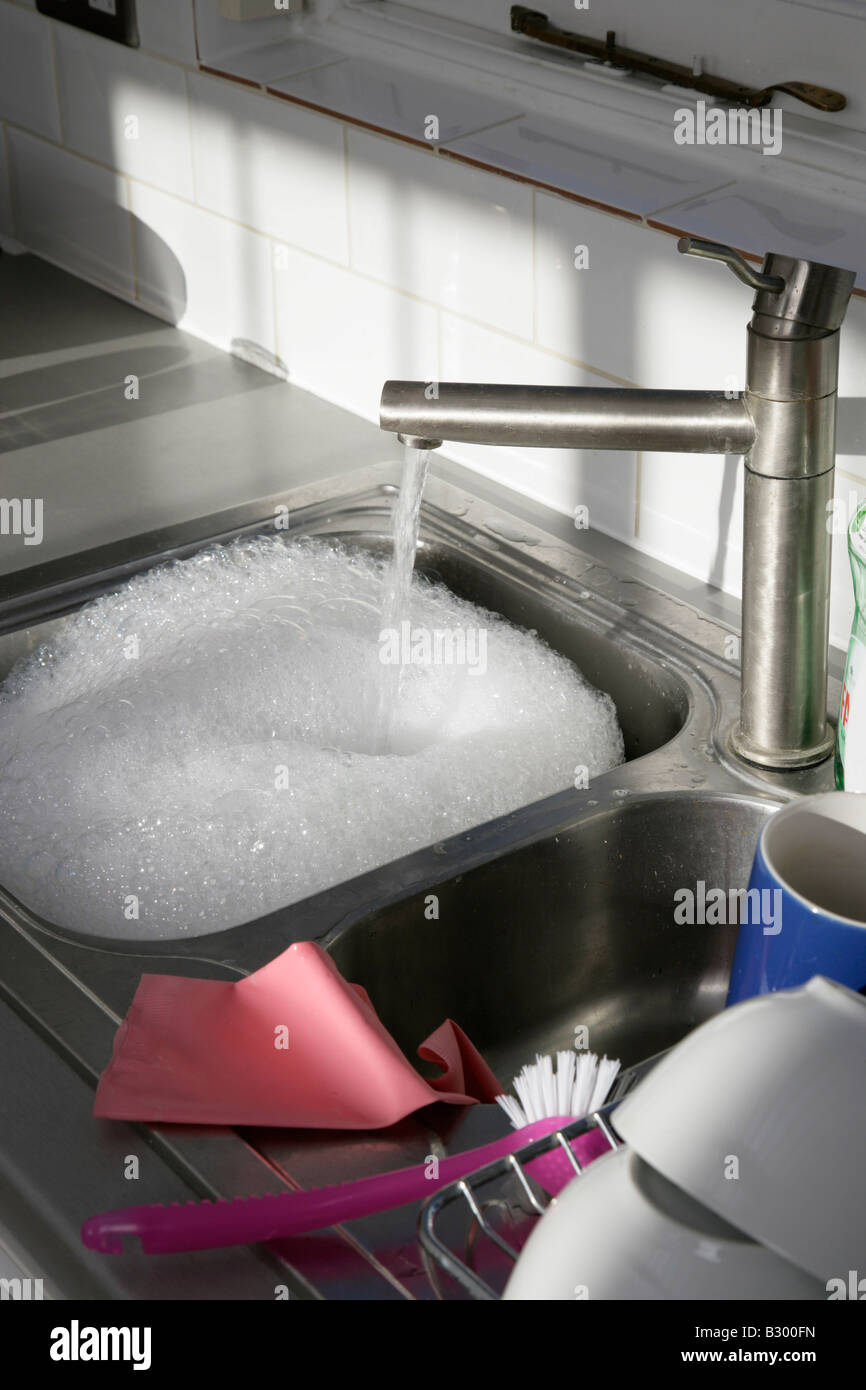 Sink Filling with Water Stock Photo Alamy