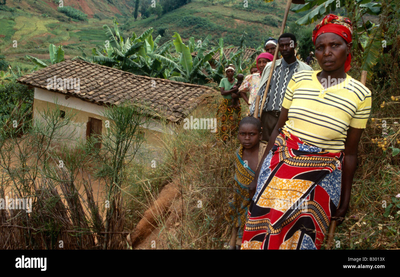 Group of villagers on plantation, Burundi Stock Photo