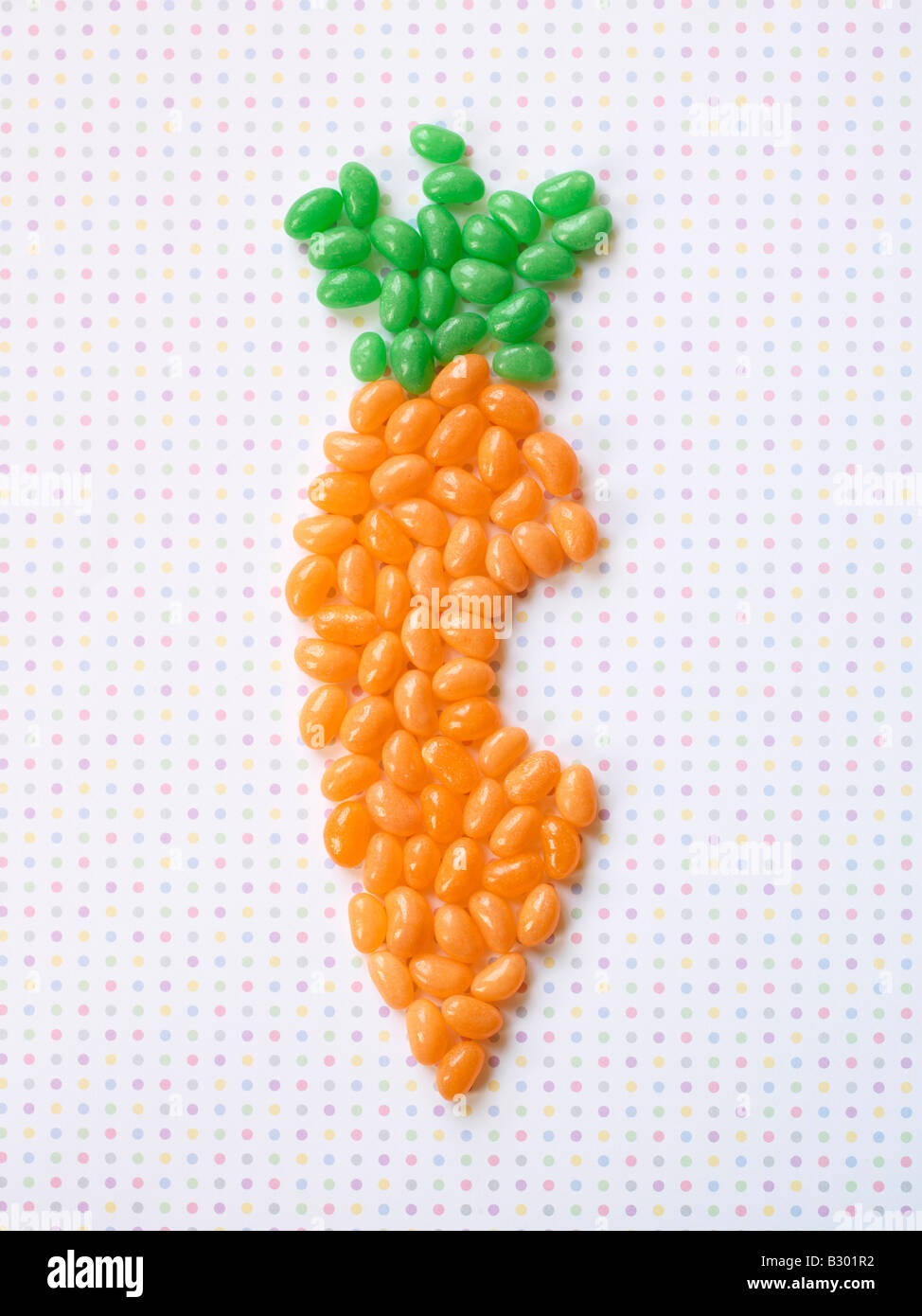 Jellybeans Shaped into Carrot with Bite Taken out of it Stock Photo