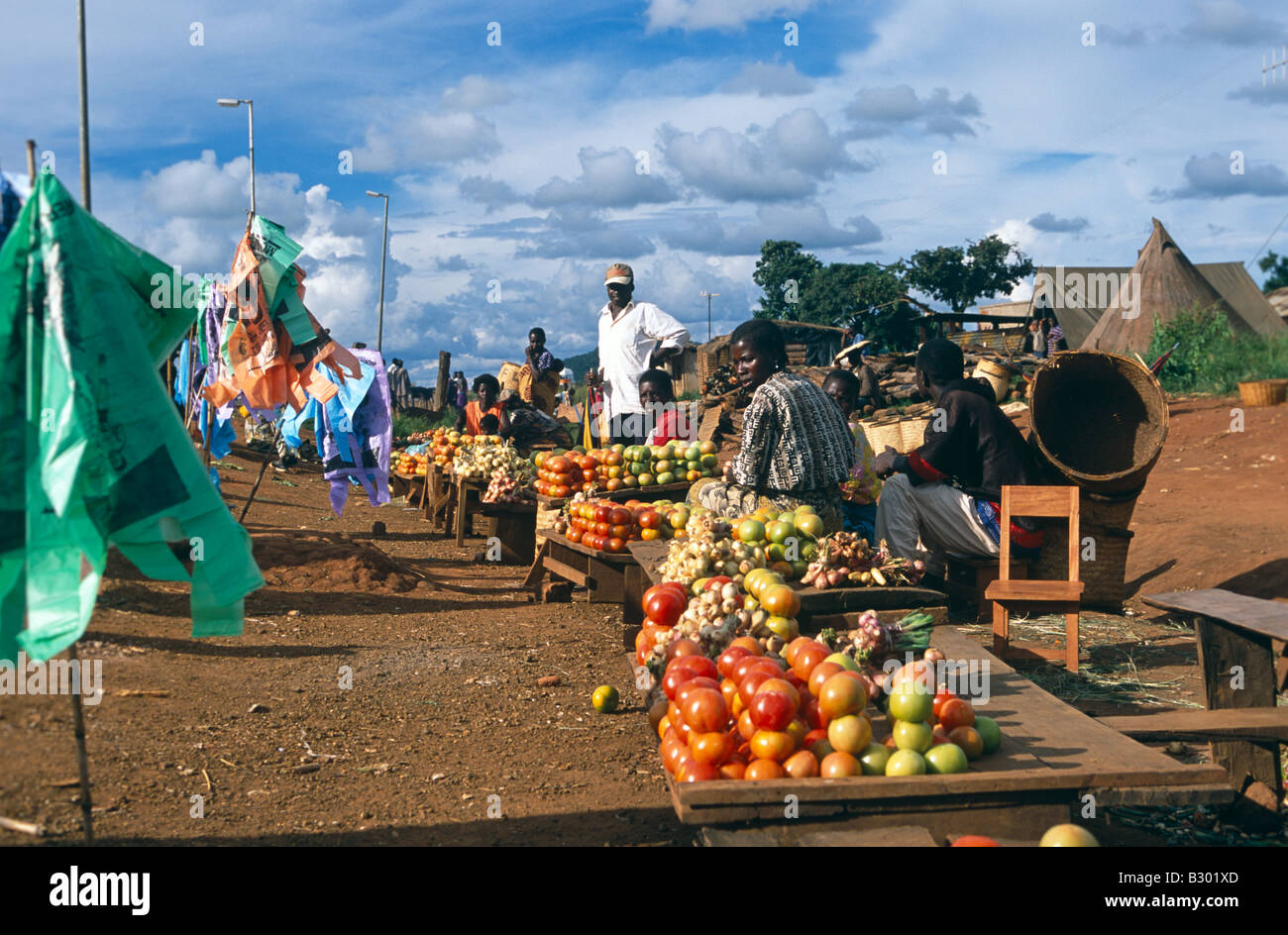 Roadside stall holders selling fresh fruit and vegetables on market
