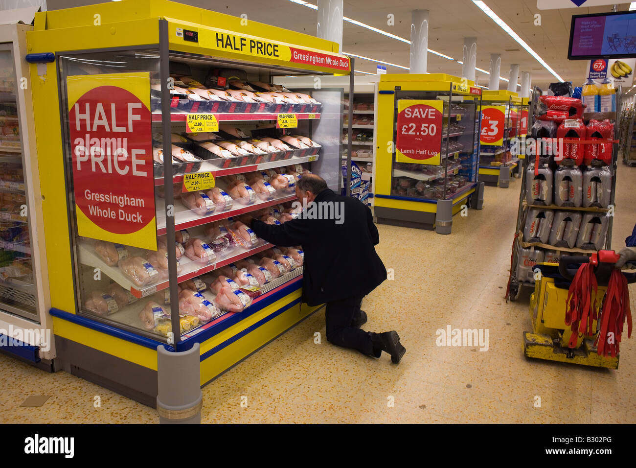 Supermarket shelf stacker hires stock photography and images Alamy