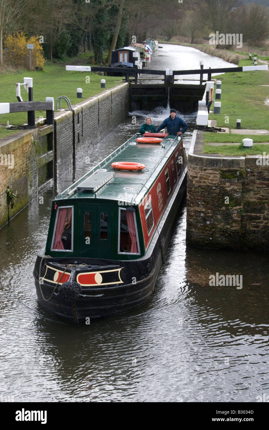 Canal boats at lock near Farncombe boat house Godalming, Surrey England UK Stock Photo