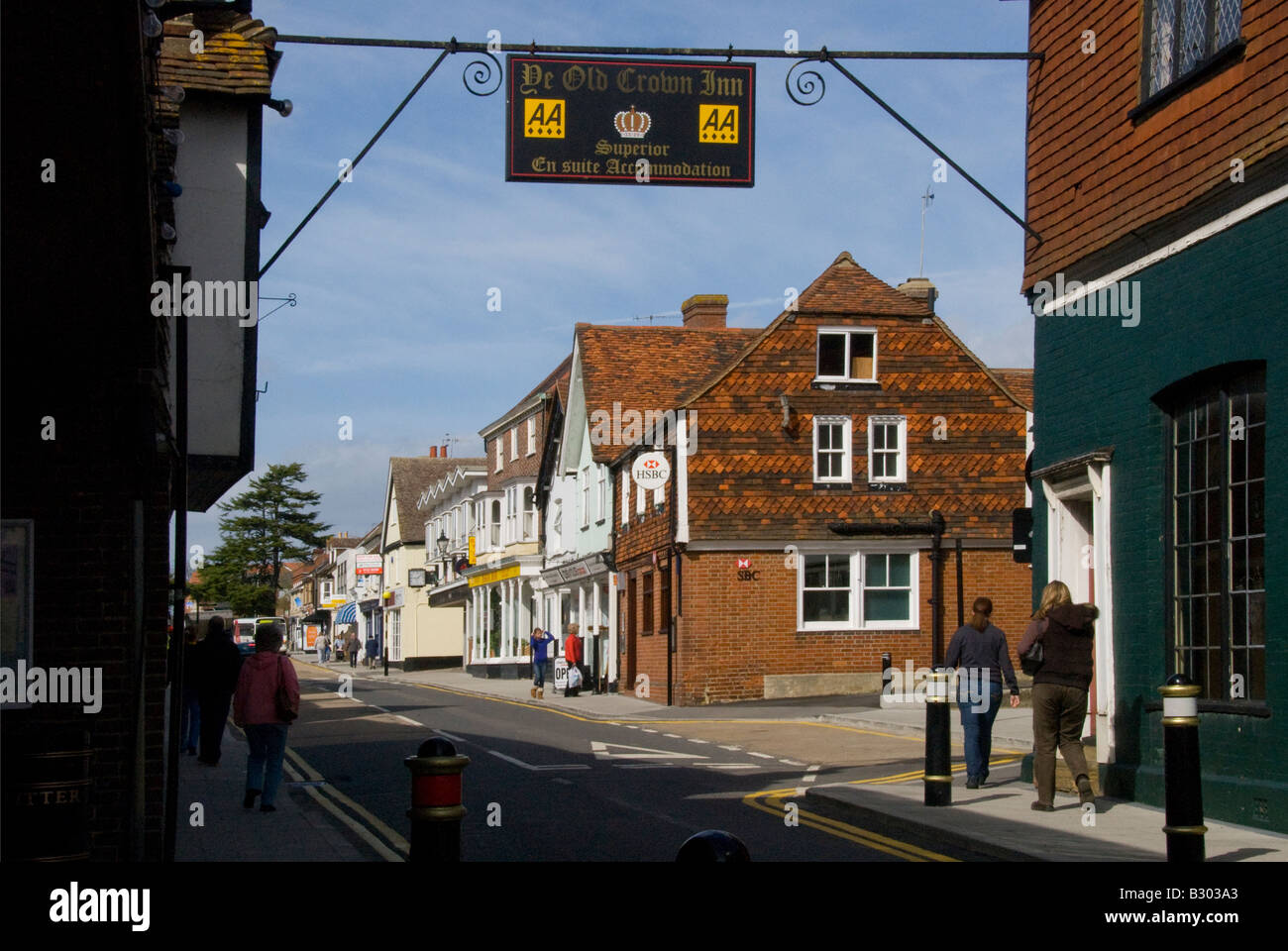 Shops in half-tiled buildings and Pub sign across road Edenbridge Kent England UK Stock Photo