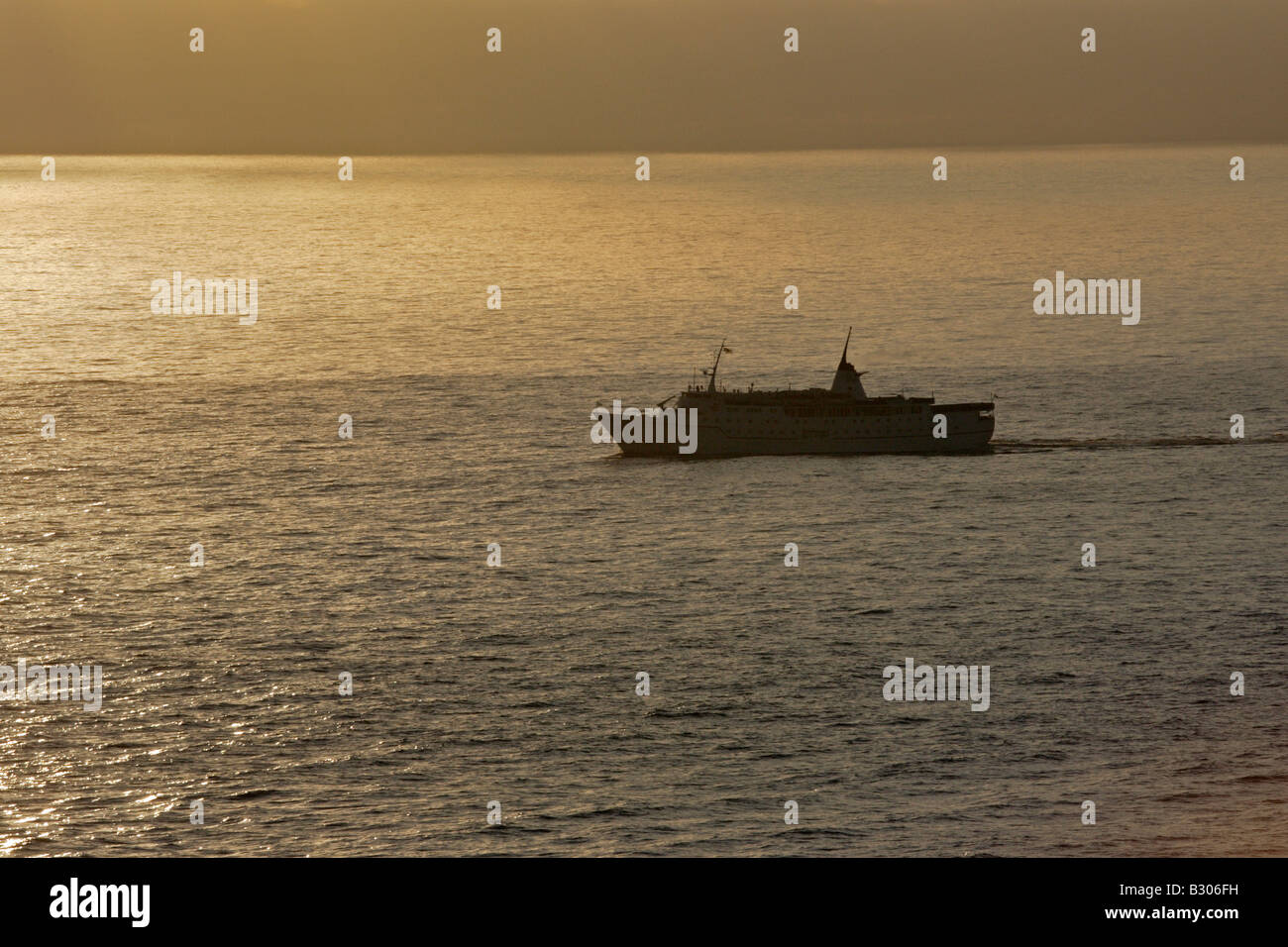 Cruise Ship at Sunset Stock Photo