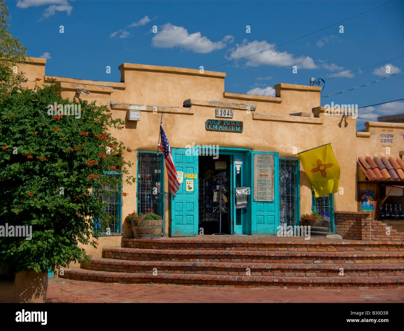 A colorful souvenir store with the american flag flying outside at Albuquerque's Old Town Stock Photo