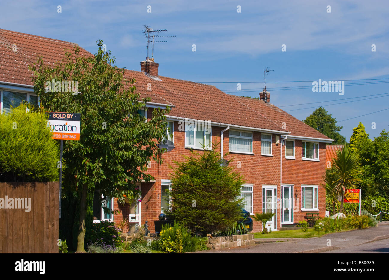 Sold and for sale signs outside houses in village of Edwinstowe