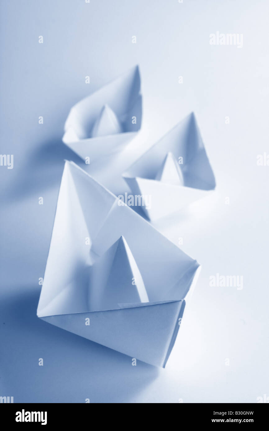 Blue Paper boat Stock Photo
